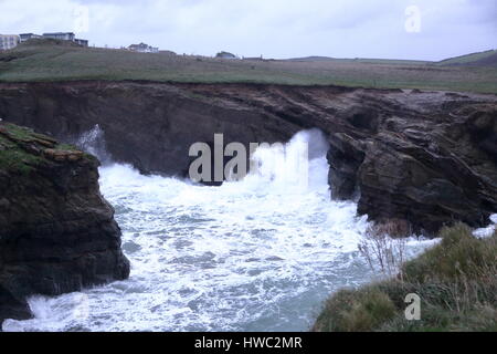 Massive storm surges in November 2013 pound the Cornish beaches of Whipsiderry, Watergate Bay and Porth Island, Newquay UK Stock Photo