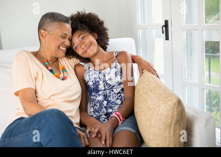 Girl spends quality time with her grandmother Stock Photo