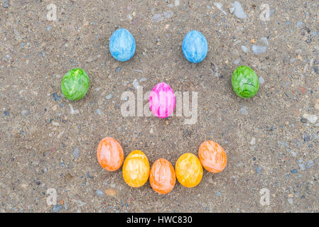Happy face made of colorful easter eggs Stock Photo