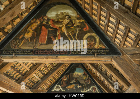 Covered wooden bridge in Lucerne, Switzerland with Plague artwork. Stock Photo