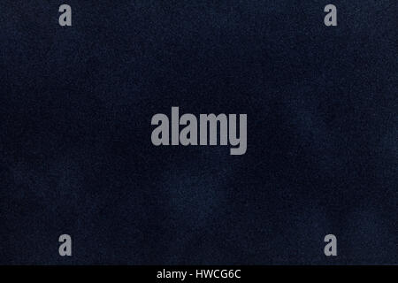 Dark blue suede fabric closeup. Velvet texture background Stock Photo