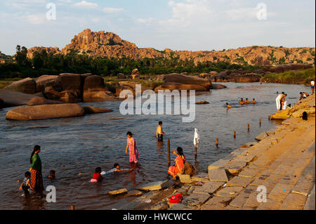 Indian people visiting Chitradurga Fort. Chitradurga is a fortification  that straddles several hills and a peak overlooking a flat area Stock Photo  - Alamy