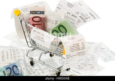 Shopping carts, bank notes and receipts, symbolic photo for buying power, consumption and inflation, Einkaufswagen, Geldscheine und Kassenbons, Symbol Stock Photo