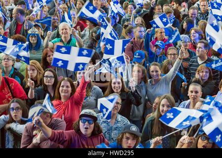 Canada, Quebec province, Quebec City, Quebec's national holiday, the show on the Plains of Abraham in the evening of June 23, outdoor concert featuring many Quebec singing stars, spectators waving Quebec flags Stock Photo