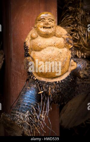 Vietnam, High Tonkin, province of Lao Cai, Sa Pa town, buddha carved root Stock Photo
