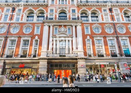 United Kingdom, London Soho and Fitzrovia districts, Oxford Street, department stores, H & M and Uniqlo shops Stock Photo