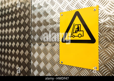 Fork lift truck warning sign on construction site Stock Photo