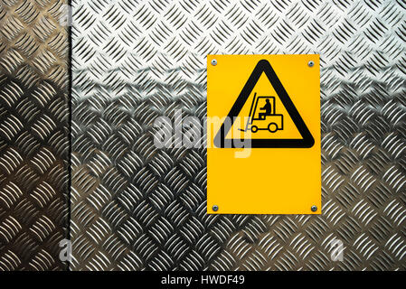 Fork lift truck warning sign on construction site Stock Photo