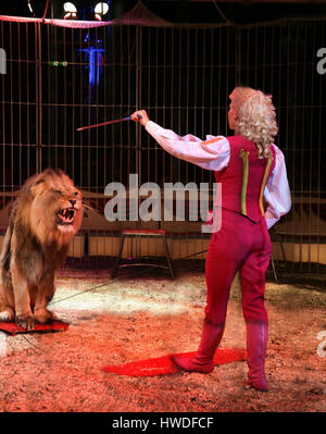 Lion tamer at Circus Renz Stock Photo