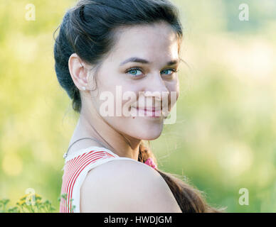 Portrait of a beautiful Russian girl in the nature Stock Photo