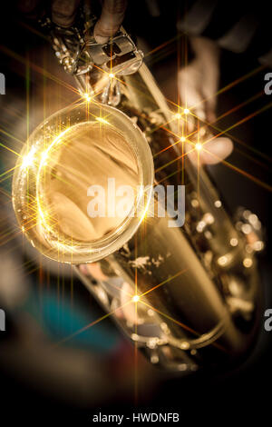 young man playing the saxophone Stock Photo