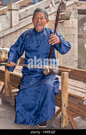 Chinaman Playing Erhu Xitang China Stock Photo
