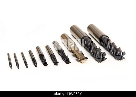 Drill Bits Set Professional Industrial Tools and Equipment on white background Stock Photo