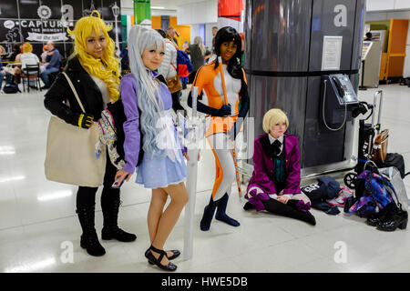 Group of young females in Anime costumes attend MCM Comic Con, Birmingham, UK 2017 Stock Photo