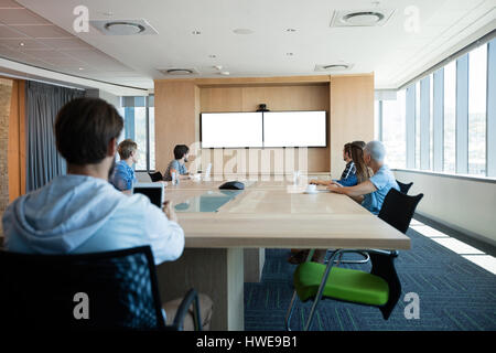 Creative business team attending a video call in conference room at office Stock Photo