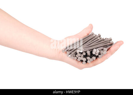 Man's hand holding metal nails. Closeup with clipping path isolated on white background Stock Photo