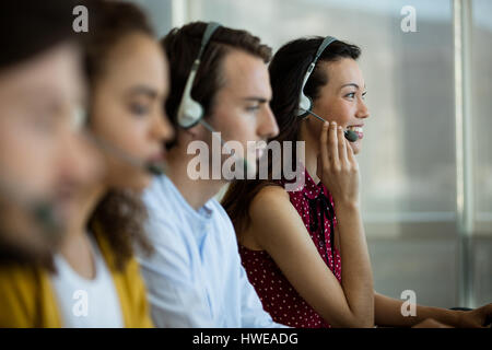 Customer service executives working at office Stock Photo