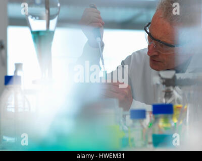 Life Science, Scientist pipetting a sample in a eppendorf vial during an experiment in the laboratory Stock Photo