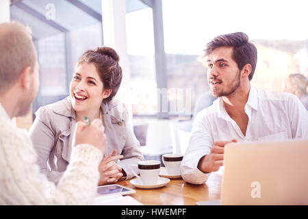 Young businessmen and woman having team meeting making in office Stock Photo