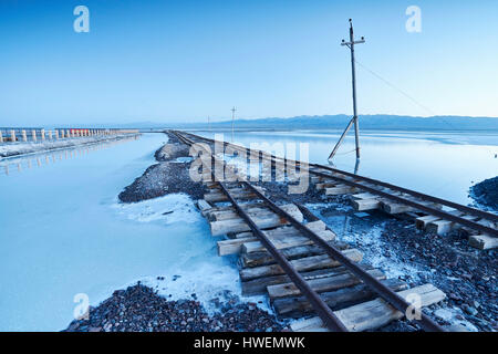 Freight train track, Haixi, Chaka Salt Lake, Qinghai Province, China Stock Photo