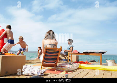 Family having fun on houseboat sun deck, Kraalbaai, South Africa Stock Photo