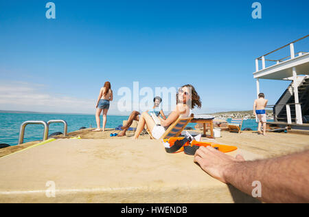 Family relaxing on houseboat sun deck, Kraalbaai, South Africa Stock Photo