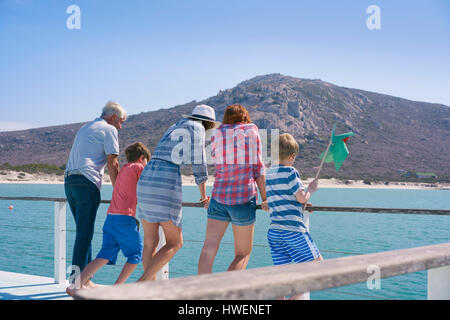 Family on houseboat looking away at view, Kraalbaai, South Africa Stock Photo
