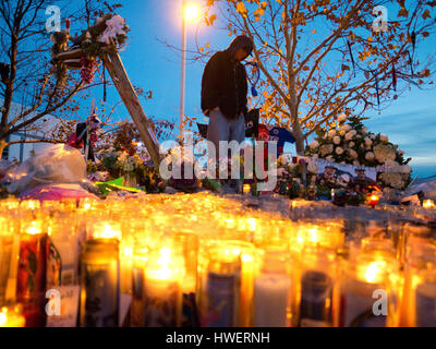Fans gather by the make shift memorial for actor Paul Walker, star of the 'Fast and The Furious', on December 8, 2013 in Valencia, California. Photo by Francis Specker Stock Photo