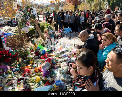 Fans gather by the make shift memorial for actor Paul Walker, star of the 'Fast and The Furious', on December 8, 2013 in Valencia, California. Photo by Francis Specker Stock Photo