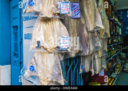 Dried codfishes for sale in Feira do Bacalhau old fashioned traditional grocery store in Porto city on Iberian Peninsula in Portugal Stock Photo