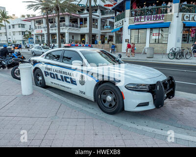 Fort Lauderdale Police Law Enforcement Vehicle Parked On The Street, Dodge Charger Cruiser City Police Stock Photo