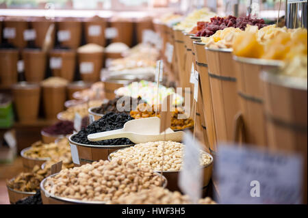 different kinds of nuts in the market Natural background Stock Photo