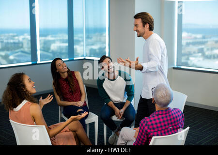 Creative business team discussing at office Stock Photo