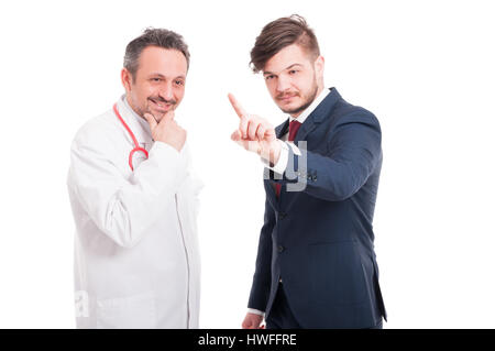 Successful businessman with friendly medic touching the virtual screen on white background Stock Photo