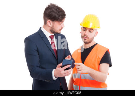 Young director showing something to constructor or engineer on the cellphone isolated on white Stock Photo