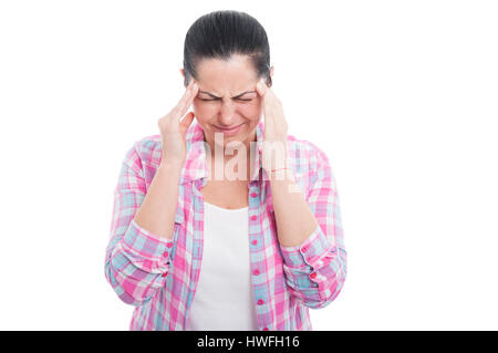 Woman massaging her temples to release  tension isolated on white background Stock Photo