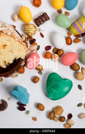 Easter rabbit, confetti, eggs, sweets, seeds, chocolates and props Stock Photo