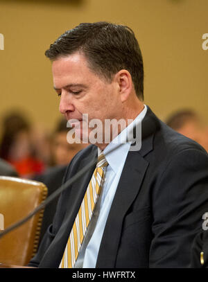 Washington DC, USA. 20th Mar, 2017. James Comey, Director of the Federal Bureau of Investigation gives testimony before the United States House Permanent Select Committee on Intelligence (HPSCI) on the 'Russian Active Measures Investigation' on Capitol Hill in Washington, DC on Monday, March 20, 2017. Credit: Ron Sachs/CNP ATTENTION EDITORS - North America Out - NO WIRE SERVICE - Photo: Ron Sachs/Consolidated/dpa/Alamy Live News Stock Photo