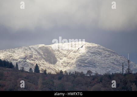 Cumbria, UK. 21st Mar, 2017. Overnight snow on the fells above Lake Windermere . Credit: Gordon Shoosmith/Alamy Live News Stock Photo