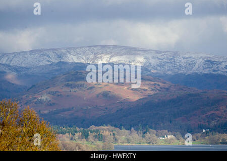 Cumbria, UK. 21st Mar, 2017. Overnight snow on the fells above Lake Windermere . Credit: Gordon Shoosmith/Alamy Live News Stock Photo