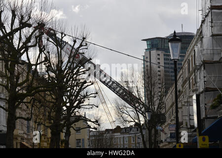 Earls Court, London, UK. 21st Mar, 2017. The worlds largest heavy lifting crane working at Earls Court. Credit: Matthew Chattle/Alamy Live News Stock Photo