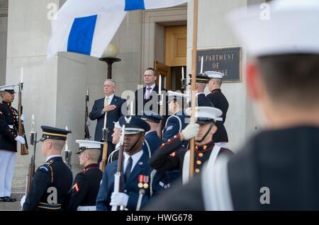 Arlington, Virginia. 21 Mar, 2017. U.S. Secretary of Defense Jim Mattis stands with Finnish Defense Minister Jussi Niinisto during the arrival ceremony at the Pentagon March 21, 2017 in Arlington, Virginia. Credit: Planetpix/Alamy Live News Stock Photo