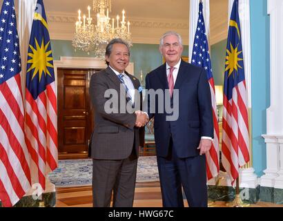 Washington, USA. 21st Mar, 2017. U.S. Secretary of State Rex Tillerson greets Malaysian Foreign Minister Dato Sri Anifah Aman prior to their bilateral meeting at the Department of State March 21, 2017 in Washington, D.C. Credit: Planetpix/Alamy Live News Stock Photo