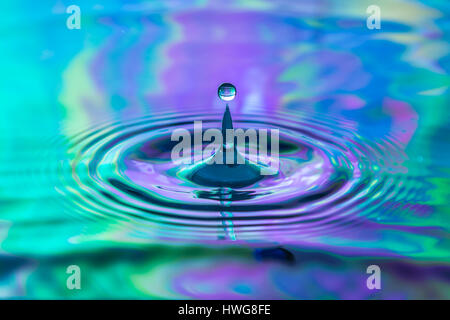 Water drop in motion Stock Photo