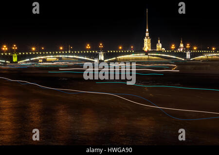 Night of St. Petersburg on the Neva river, traces of light, many passing boats Stock Photo
