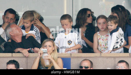 David Beckham's sons, Brooklyn, center, Romeo, left, and Cruz watch the Los Angeles Galaxy play Chelsea with Eva Longoria, background with sunglasses, at the Home Depot Center in Carson, CA on Saturday, July 21, 2007. Photo credit: Francis Specker Stock Photo