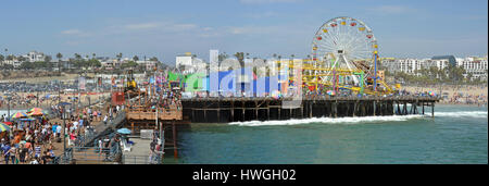 Los Angeles, USA - July 14, 2013; Panoramic View of the Santa Monica Pier & Beach on a very hot Summer day. Stock Photo