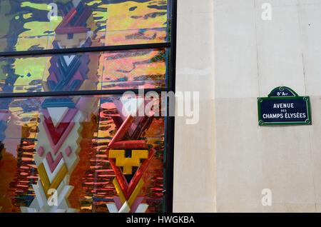 PARIS FRANCE 7 JUNE  2015: Detail of Louis Vuitton shopfront Champs Elysees Stock Photo