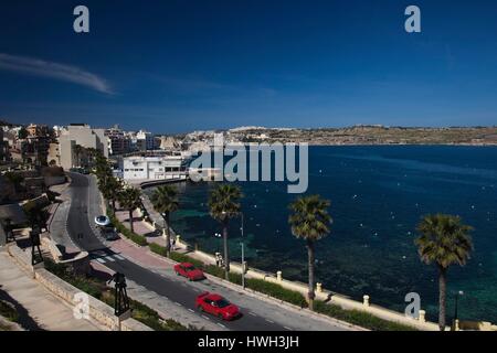 Malta, St. Paul's Bay area, Bugibba, town waterfront with view towards Xemxija Stock Photo