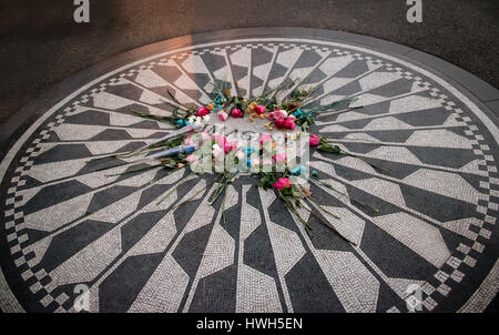 The Imagine mosaic with flowers on John Lennon death anniversary at Strawberry Fields in Central Park, Manhattan - New York, USA Stock Photo